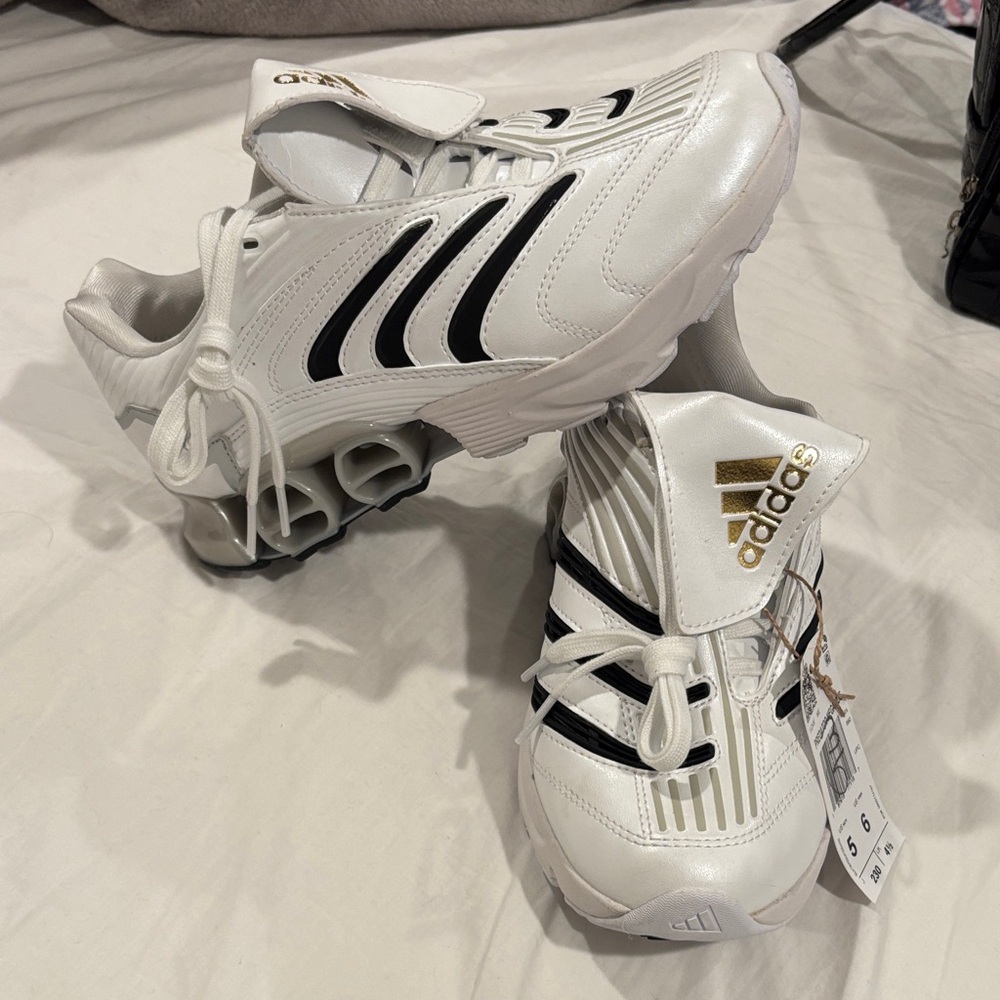 Adidas predator megaride  White Sneakers with Black Stripes and Gold Details